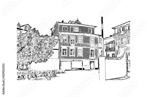 Building view with landmark of Guimaraes is a city in northern Portugal. Hand drawn sketch illustration in vector.