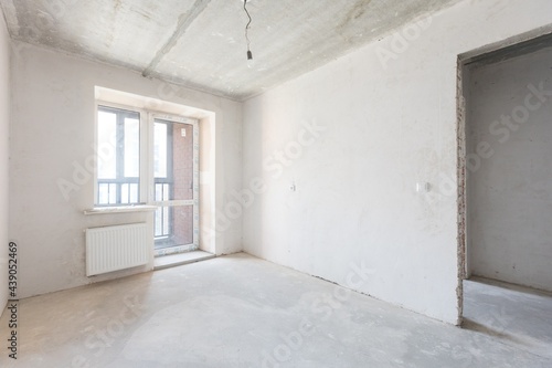 interior of the apartment without decoration in gray colors