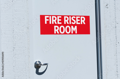 Fire Riser Room sign on the door leading to dedicated space for fire protection equipment photo