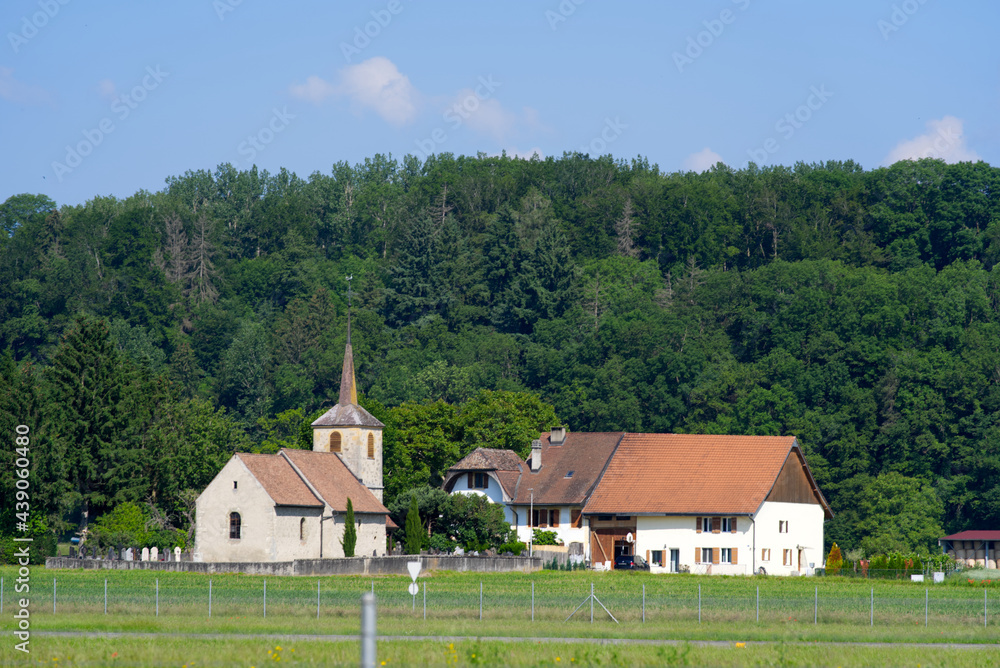 Village of Morens at a beautiful summer day. Photo taken June 11th, 2021, Morens, Switzerland. Village of Morens at a beautiful summer day. Photo taken June 11th, 2021, Morens, Switzerland.