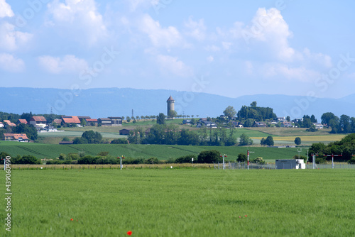 Landscape at the Swiss air force airbase at Payerne at summertime with medieval tower in the background. Photo taken June 11th, 2021, Payerne, Switzerland. © Michael Derrer Fuchs