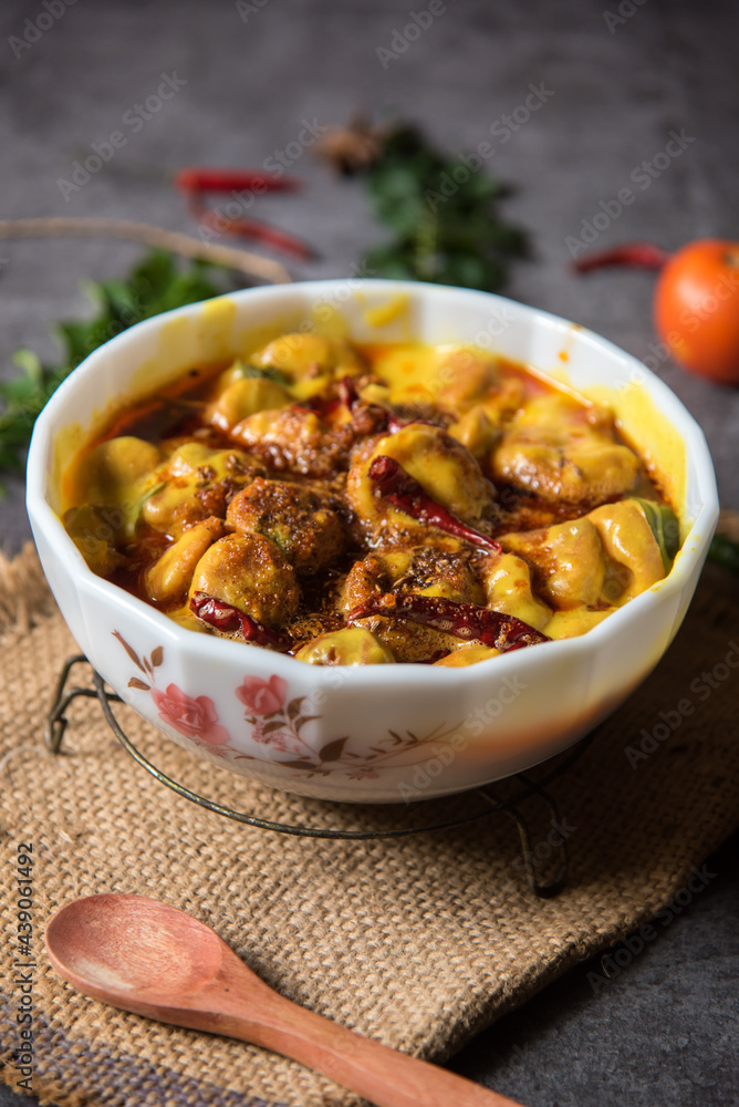 Kadhi is a dish originating in Rajasthan, India. Made of thick gravy based on gram flour, and contains vegetable fritters called pakoras. A north Indian delicacy. Kadhi is a dish originating in Rajasthan, India. Made of thick gravy based on gram flour, and contains vegetable fritters called pakoras. A north Indian delicacy.