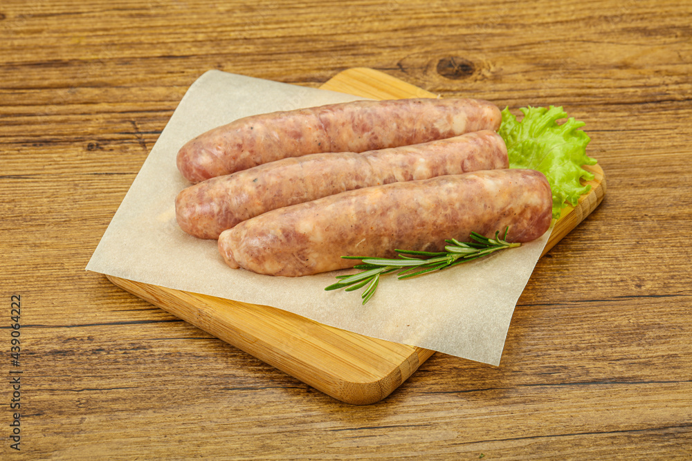 Raw pork meat sausages for grill