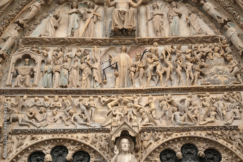 Bourges, France. Decorative figures on the facade of the medieval St. Stephen's Cathedral 