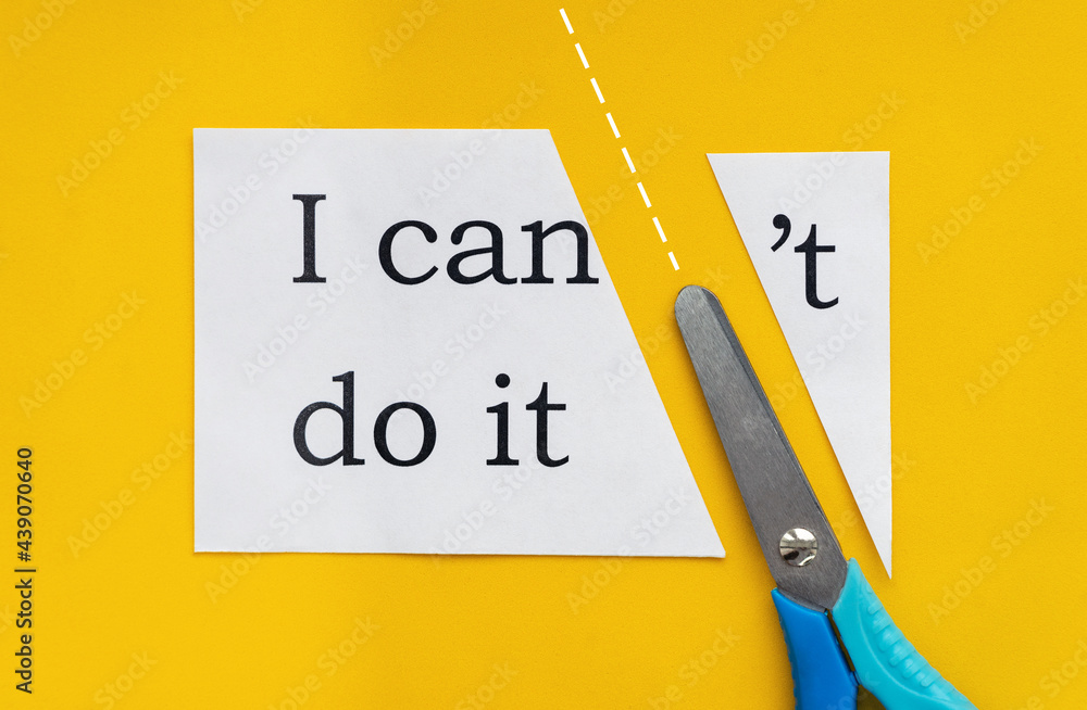 Paper with text I can't do it (I can do it) and scissors on yellow background. Dotted dividing line ka decision making concept. - obrazy, fototapety, plakaty 