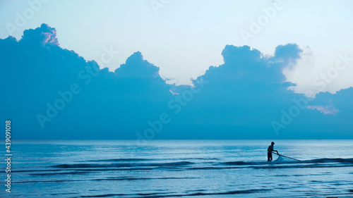 silhouette of a fisherman © suhaimi