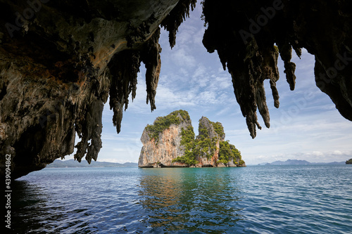 View from karst cave on tropical island. Beautiful seascape near Krabi, Thailand.