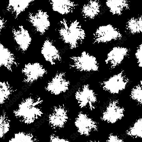 Vector seamless pattern with ink stains on black background. Illustration with grungy texture