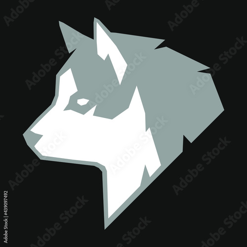 Abstract gray and white husky dog head side view portrait symbol on black backdrop. Design element