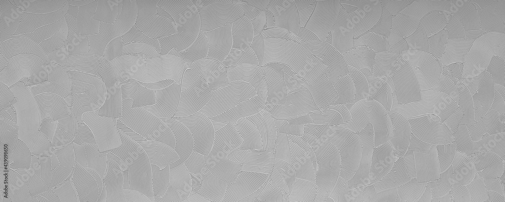 Naklejka premium The pattern on the wall. Gray background. Relief, waves.