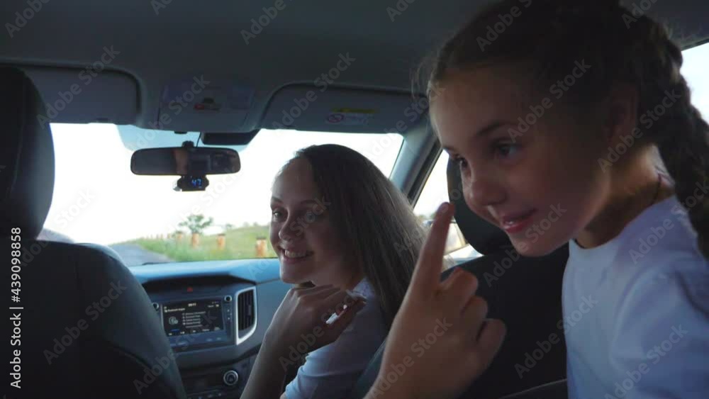 Family travel by car. A happy family has a fun summer vacation with their children. Road safety. Life insurance. Family travel by car. A happy family has a fun summer vacation with their children. Road safety. Life insurance.