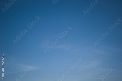 Beautiful dark blue sky with white clouds