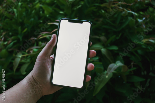 Man using smartphone. Mobile phone screen mockup.