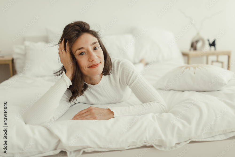 Yoga at home. girl resting in the bedroom after training. Yoga at home. girl resting in the bedroom after training.