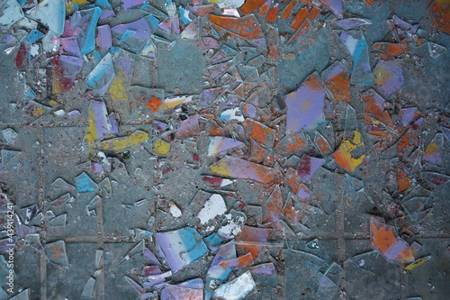 Abstract painting of broken stained glass on tiles