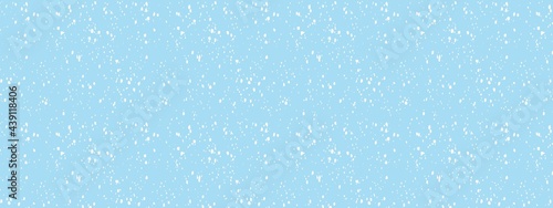 snowfall in grey blue sky, abstract snow background, christmas background in winter