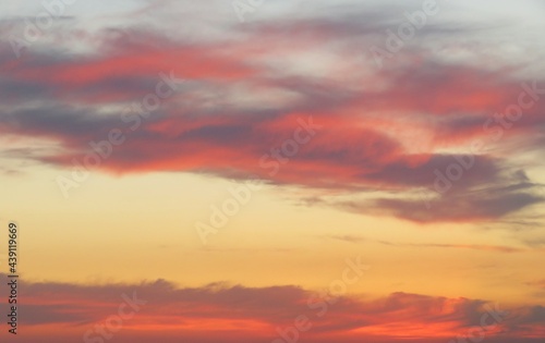 Beautiful fiery pink sunset background in the sky