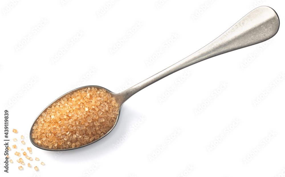 yellow sugar in the silver spoon, isolated on white background, top view yellow sugar in the silver spoon, isolated on white background, top view