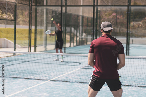 paddle tennis players playing a game
