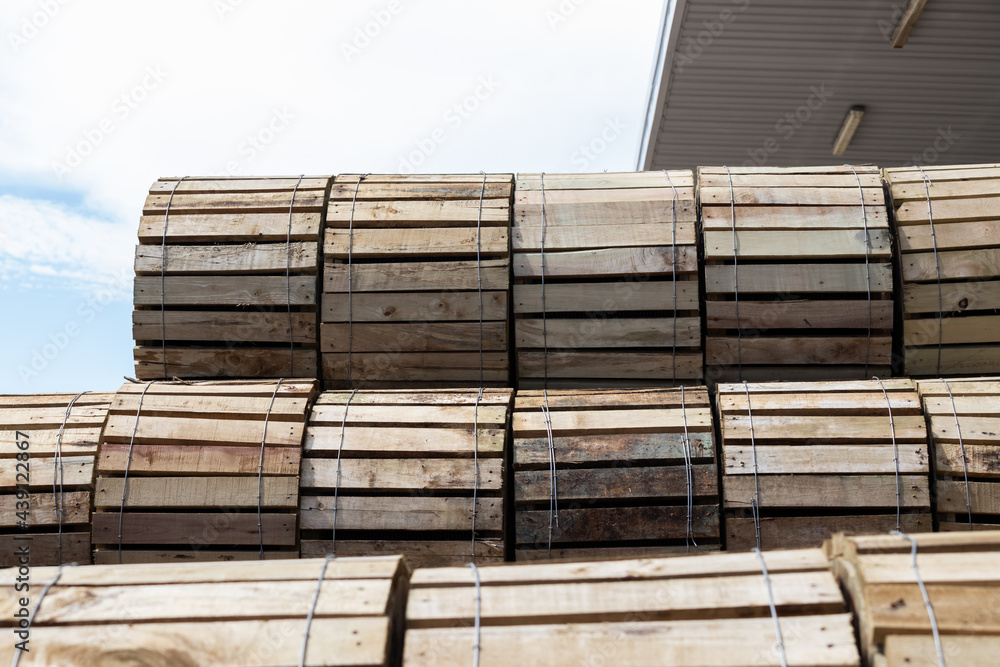 wooden coil packaing of wire electric cable in warehouse. electric cable coils in wooden rollers ready to shipment.