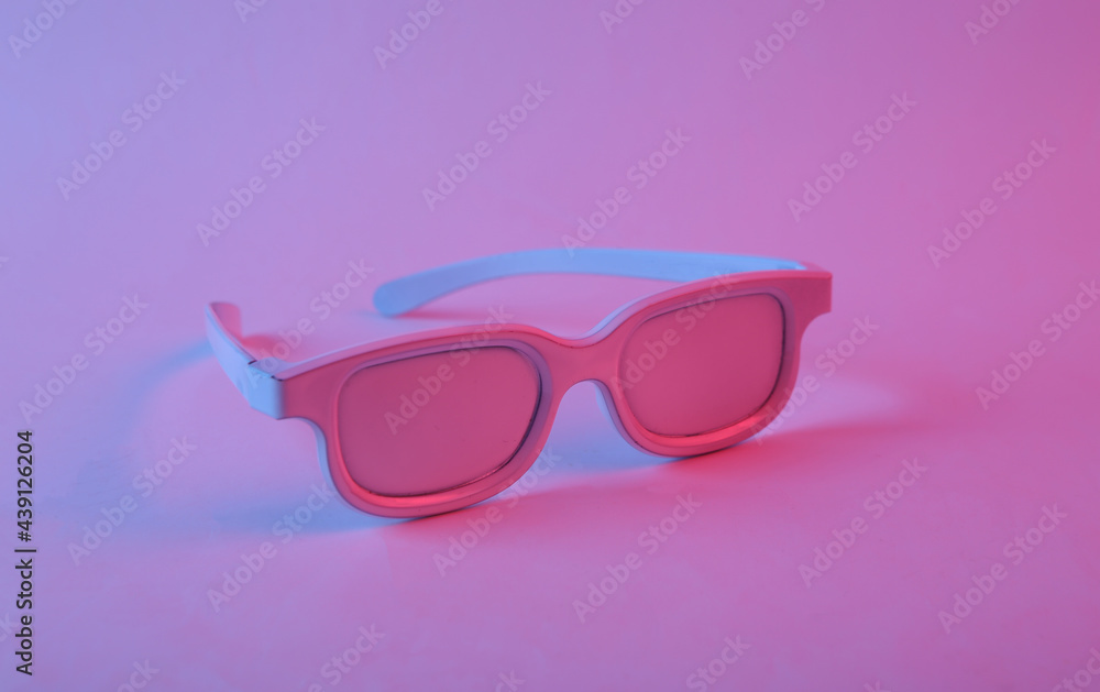 White glasses in pink blue gradient neon light. Minimalism White glasses in pink blue gradient neon light. Minimalism