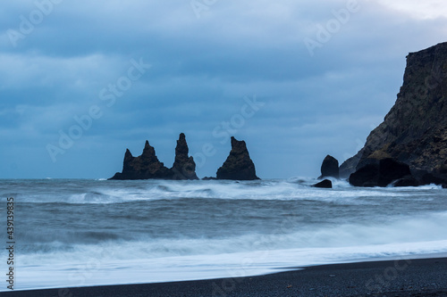 Long exposure of the basalt sea stacks of Reynisdrangar after sunset, Vik, Iceland