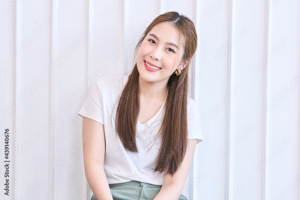 Beautiful woman smile on white wall background Beautiful woman smile on white wall background