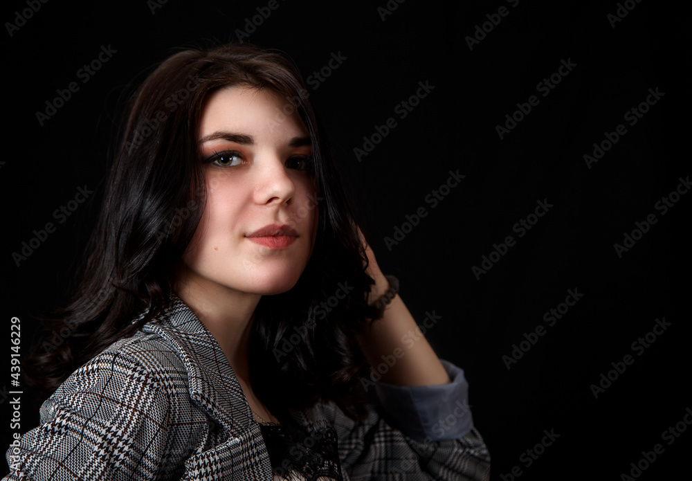 portrait of a young beautiful girl in the studio