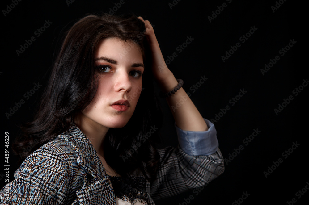 portrait of a young beautiful girl in the studio