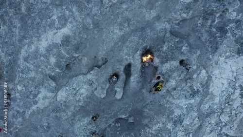 Top aerial view of burning fires from vents in rocks-inspiration for the fire breathing Chimaera monster. Natural gas flames burning at Yanartas, Cirali, Olympos, Turkey