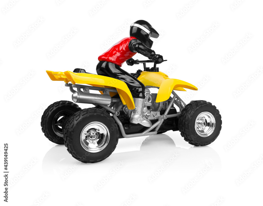 Toy ATV four wheeler bike isolated on white background