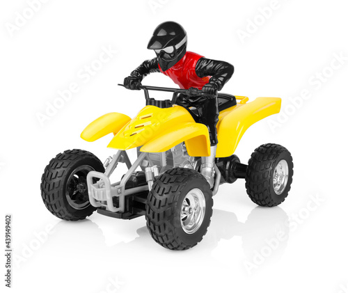 Toy ATV four wheeler bike isolated on white background