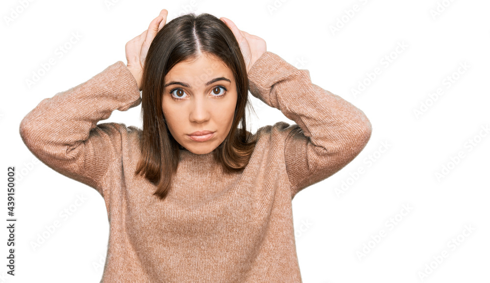 Young beautiful woman wearing casual clothes doing bunny ears gesture with hands palms looking cynical and skeptical. easter rabbit concept. Young beautiful woman wearing casual clothes doing bunny ears gesture with hands palms looking cynical and skeptical. easter rabbit concept.