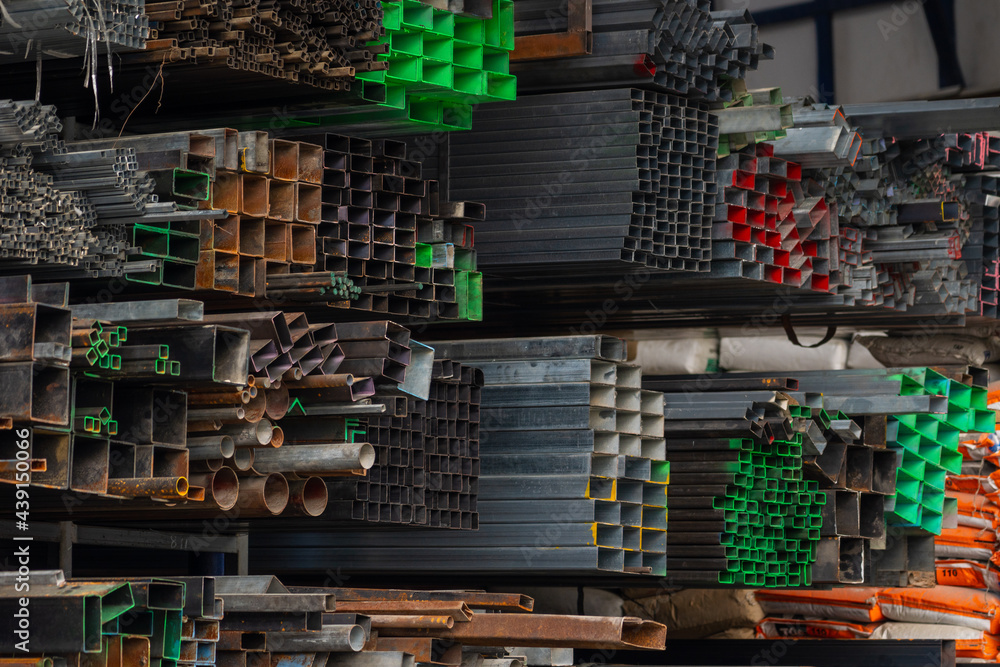 Stock warehouse many kind of steel tube, pipes round steel. manufacturing and building systems. , Noise,Out of focus. Stock warehouse many kind of steel tube, pipes round steel. manufacturing and building systems. , Noise,Out of focus.