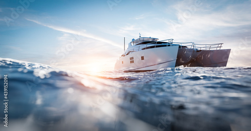 Fototapeta Catamaran motor yacht on the ocean
