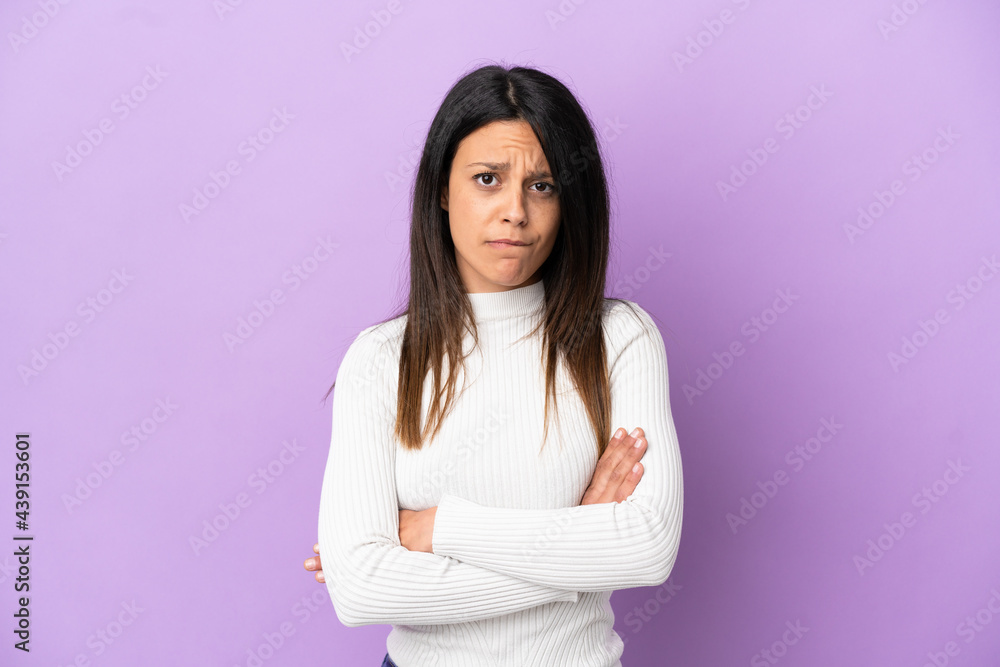Young caucasian woman isolated on purple background feeling upset Young caucasian woman isolated on purple background feeling upset