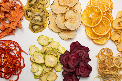 The set of different chips from dried fruits photo