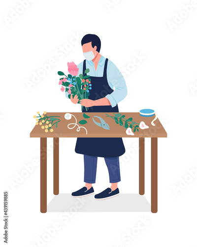 Florist with flowers in mask semi flat color vector character. Designer figure. Full body person on white. Floriculture isolated modern cartoon style illustration for graphic design and animation