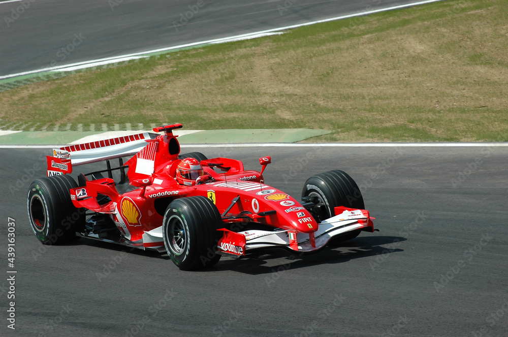 Foto Stock Imola, Italy - 23 April 2006: F1 World Championship. San Marino  Grand Prix, Michael Schumacher in action on Ferrari 248 F1 during practice.  | Adobe Stock