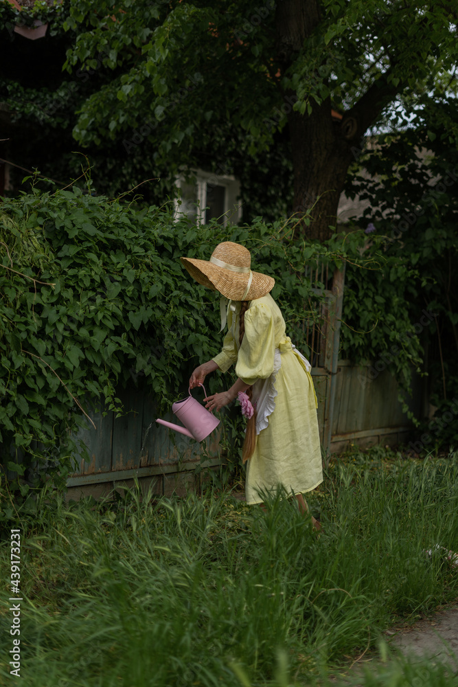 young woman gardening outside in nature