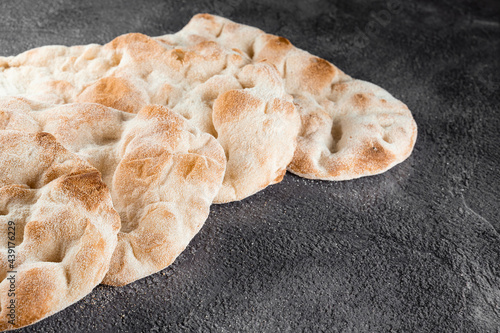 Dough for pinsa romana and scrocchiarella from 4 types of flour. Italian gourmet cuisine. Traditional dish in italy. photo