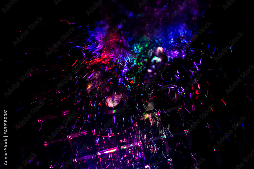 Colored water texture. Splashes of water lit in different colors. Colored water texture. Splashes of water lit in different colors.