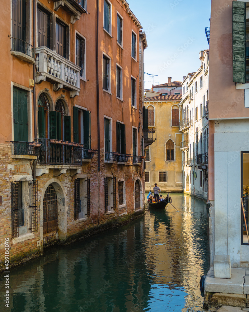 Narrow Venice Canal with Gondola
