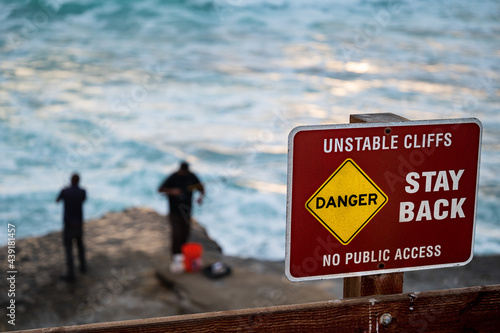 Danger Sign Stay Back Unstable Cliffs at La Jolla Cove, California, Located in San Diego County.