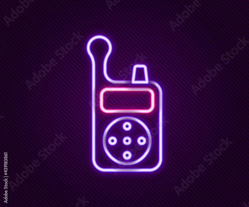Glowing neon line Baby Monitor Walkie Talkie icon isolated on black background. Colorful outline concept. Vector