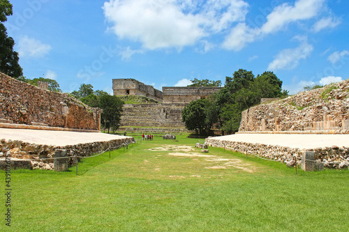 Mayan Ball court and Governor palace on background, territory of the Uxmal historical site, ancient city, representative of the Puuc architectural style, Yucatan peninsula, Mexico photo