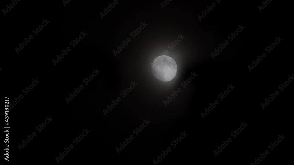 Time lapse video of fast moving full glowing mooon in cloudy night. Time lapse video of fast moving full glowing mooon in cloudy night.
