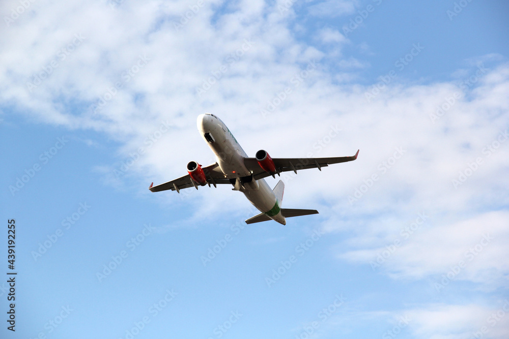 Plane taking off from the runway, flying through the clouds, increasing its height
Plane taking off from the runway, flying through the clouds, increasing its height