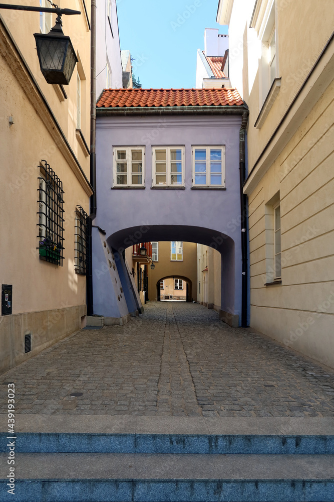 Warsaw, Poland. Warsaw Old Town, Dawna street (Old Street). Blue passage gate