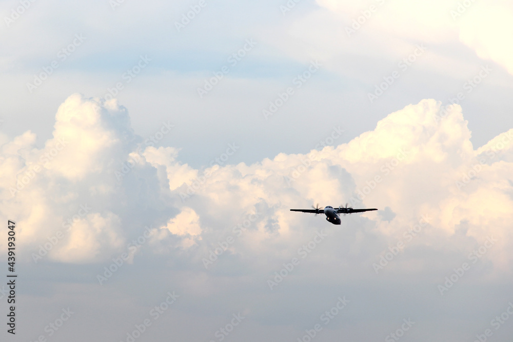 Plane taking off from the runway, flying through the clouds, increasing its height
Plane taking off from the runway, flying through the clouds, increasing its height